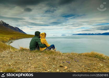 A couple contemplating the beautiful landscape