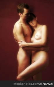 A couple embrace eachother in the nude