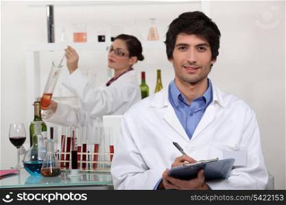 A couple in a laboratory.