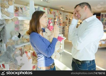 a couple in a stuffed toys shop