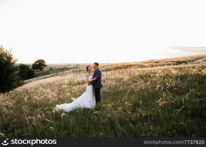 A couple in love a guy and a girl on a walk in the forest belt