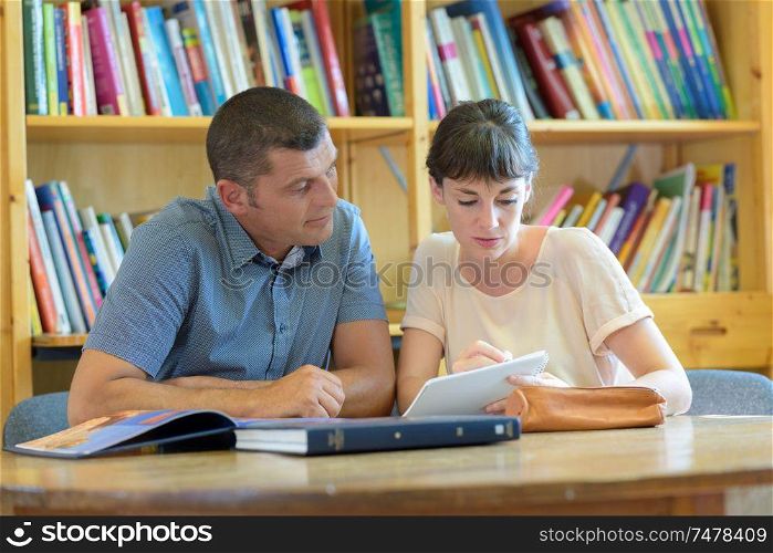 a couple in the library
