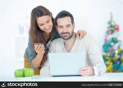 a couple is buying something on-line
