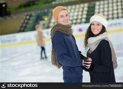 a couple is skating couple