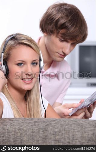 A couple listening to music.