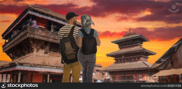a couple of tourists travel around the city of Kathmandu. Nepal.