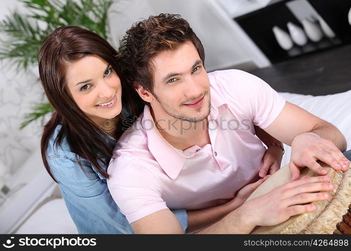 a couple playing djembe