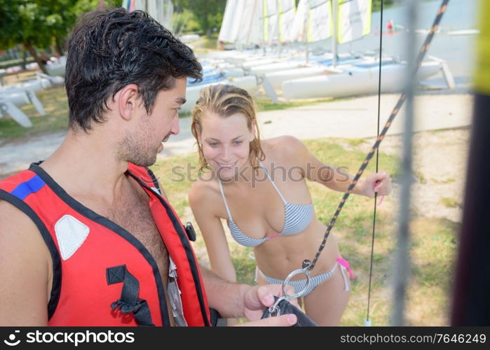 a couple tying the rope