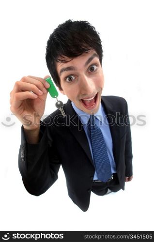 A crazy businessman handing a key.