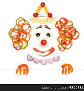 A creative food concept of a sad drama clown made of vegetables and fruits in a menu.