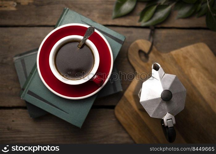 a cup coffee and moka with milk jug 