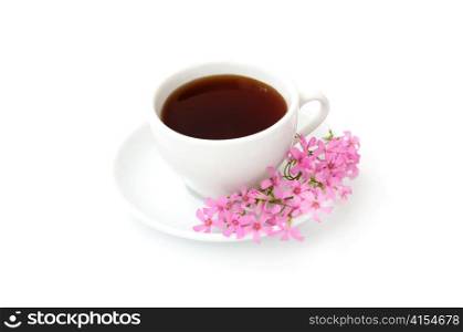 A cup of black coffee with flowers on a white background