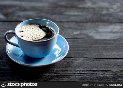 A cup of blue coffee.