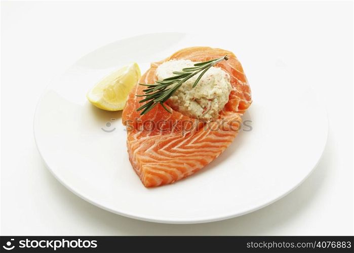 A cut of raw salmon on a plate