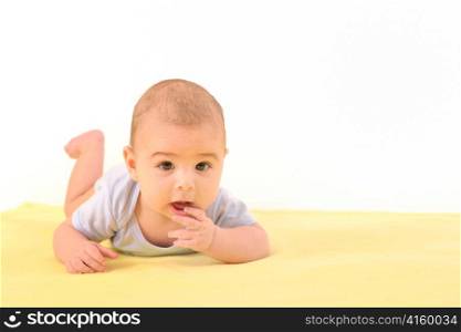 A cute baby boy on white background