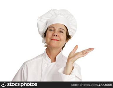 A cute female chef waving her hand in a gesture of presentation. Isolated on white.
