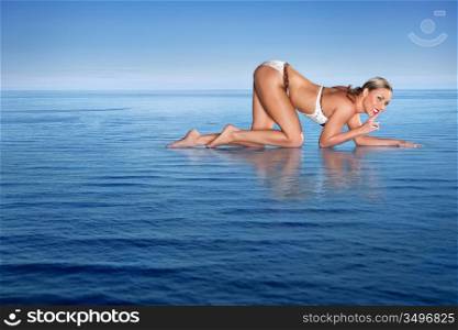A cute semi-naked girl on the watery waste.