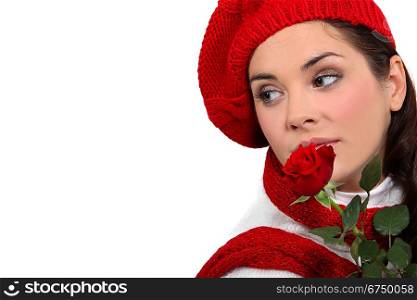 A cute woman with a rose.