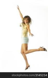 A dancer jumps into the air against a white backdrop.