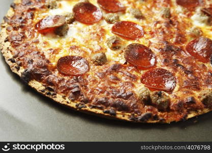 A delicious and tasty pepperoni and beef pizza