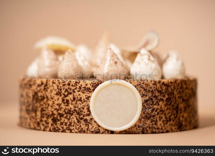 A delicious-looking dessert of a round cake on a brown plate, topped with a generous helping of fluffy white whipped cream. A cake sitting on top of a brown plate topped with whipped cream
