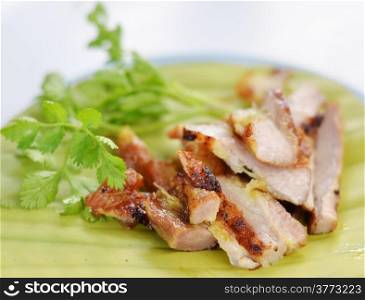 a delicious sliced grilled pork served with vegetables