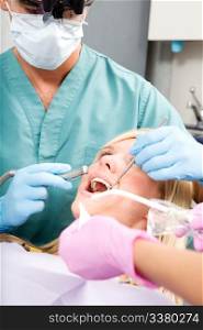 A dentist working on a tooth at a dental clinic