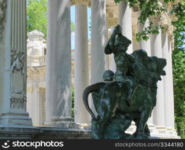 a detail of sculpture of a lion and child