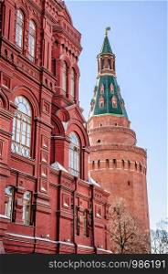 A detail of the Moscow's History Museum with a Kremlin's tower in the background