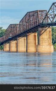 a detail of The Old Chain of Rocks bridge and historic water (intake) tower on the Mississippi River near St Louis