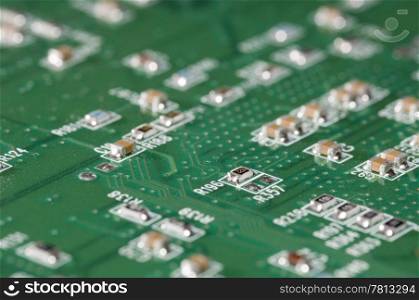A detailed macro shot of a Integrated Circuit Board, looking like roads and cabins in a village, seen from above
