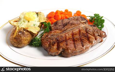 A dinner of a Porterhouse (or T-bone) steak, with baked potato filled with mashed parsley potato topped with butter, served with sliced carrots and garnished with parsley