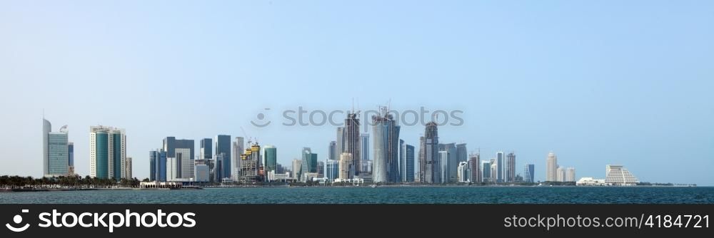 A distant view of the entire New District skyline of Doha, Qatar, some of it still under construction when the photo was taken in March 2009.