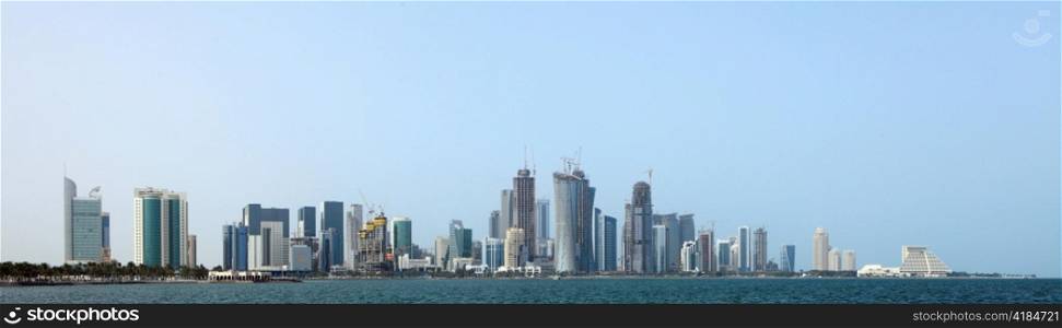 A distant view of the entire New District skyline of Doha, Qatar, some of it still under construction when the photo was taken in March 2009.