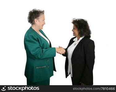 A diverse female business team shaking hands. Isolated on white.