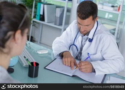 a doctor checking his agenda