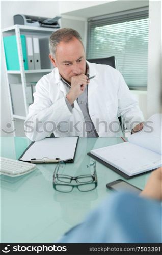 a doctor in consulting room