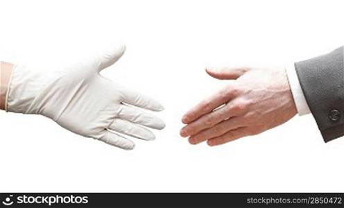 A doctor shaking hands with a business man
