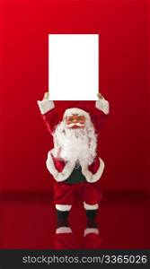 a doll of Santa Claus on a red background