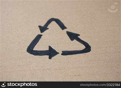 A drawing of a recycle logo