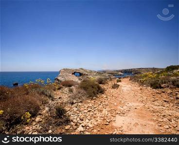 A dry dusty path on the island of Comino, Malta