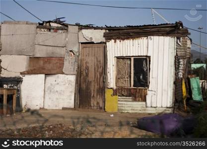 A fairly typical home in a South African township. These shacks are often built with whatever materials can be found.