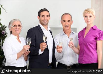 a family toasting with sparkling wine