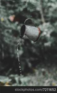 a fantasy watering jar in the garden