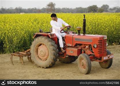 A farmer on his tractor