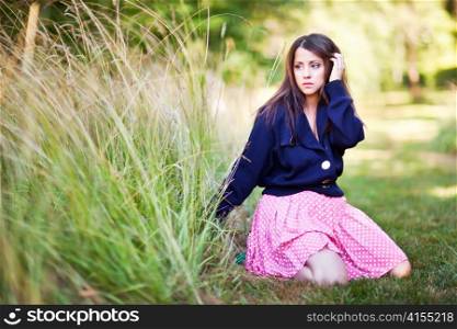 A fashion shot of a beautiful asian woman outdoor