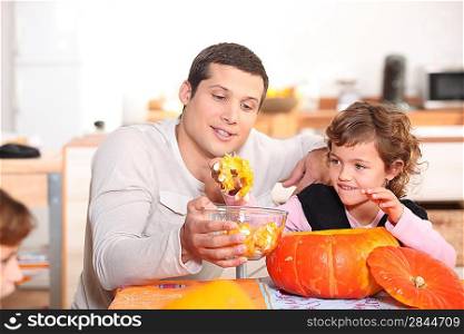 a father and his daughter at Halloween time