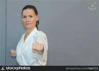 a female athlete practicing karate