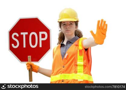 A female construction worker wearing reflective vest & holding a stop sign - isolated.