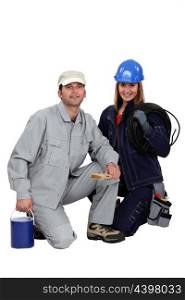 a female electrician and a male house painter